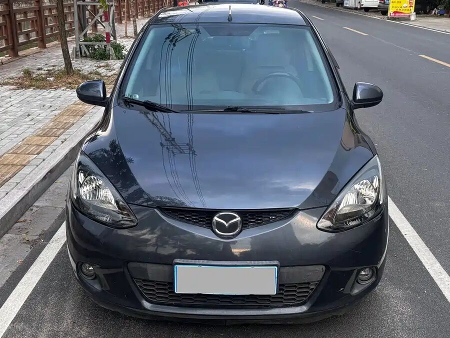 Mazda 2, 2010 — фото продавца с che168